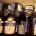Captură la Vama Oancea. Peste 70 de sticle cu alcool de contrabandă, descoperite în remorcile unui microbuz și ale unui autocar