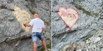 Declarație de dragoste cu spray pe o stâncă de pe Transfăgărășan. Gestul unui turist a stârnit un val de revoltă în mediul online